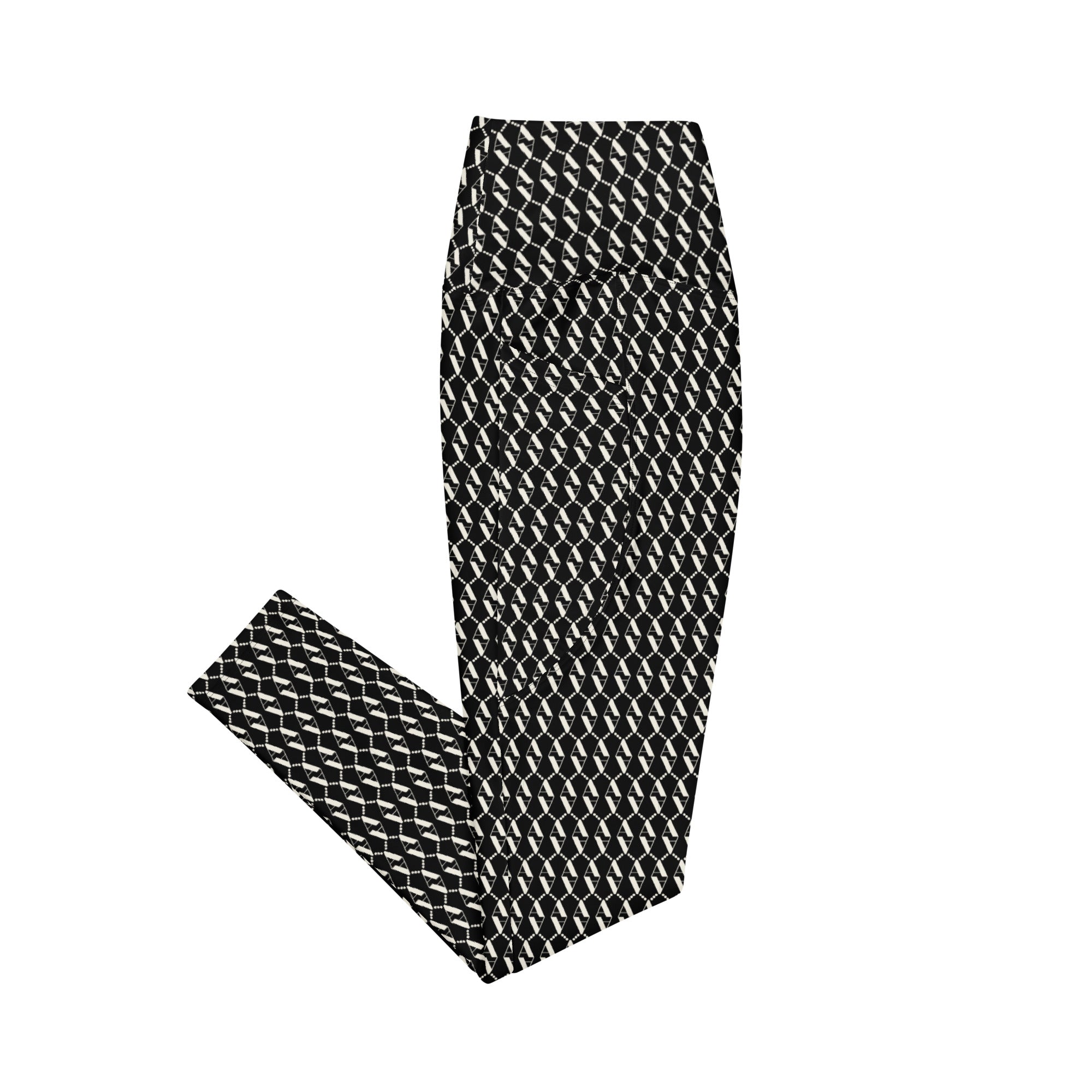 Side view of Le Monogramme recycled polyester leggings in black with iconic  monogram printed in beige