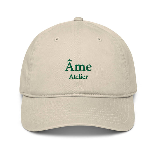 Front view of Âme Atelier embroidered cap in beige