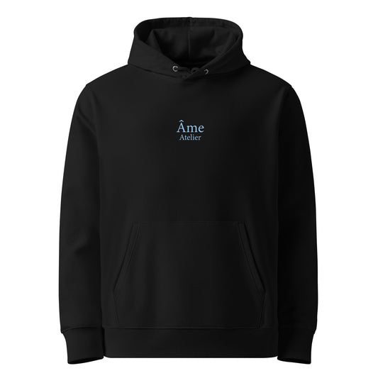 Front view of Âme Atelier Club organic cotton hoodie in black with frozen blue details