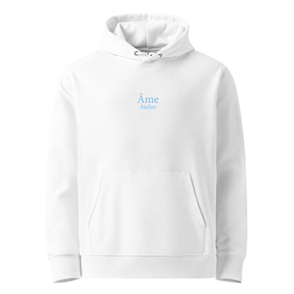 Front view of Âme Atelier Club organic cotton hoodie in white with frozen blue details