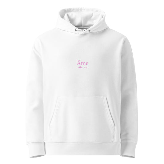 Front view of Âme Atelier Club organic cotton hoodie in white with powder pink details