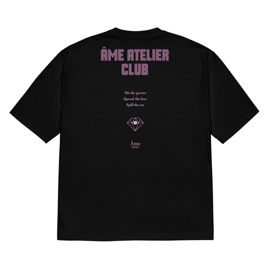 Back view of Âme Atelier Club oversized t-shirt in black with powder pink details