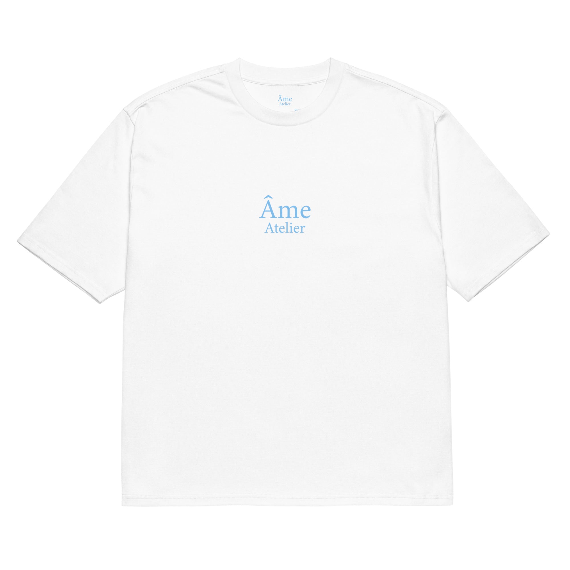 Front view of Âme Atelier oversized t-shirt in white with frozen blue details
