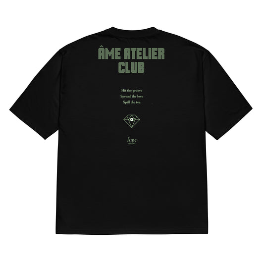 Back view of Âme Atelier Club oversized t-shirt in black with pistachio details