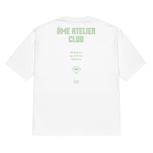 Back view of Âme Atelier Club oversized t-shirt in white with pistachio details