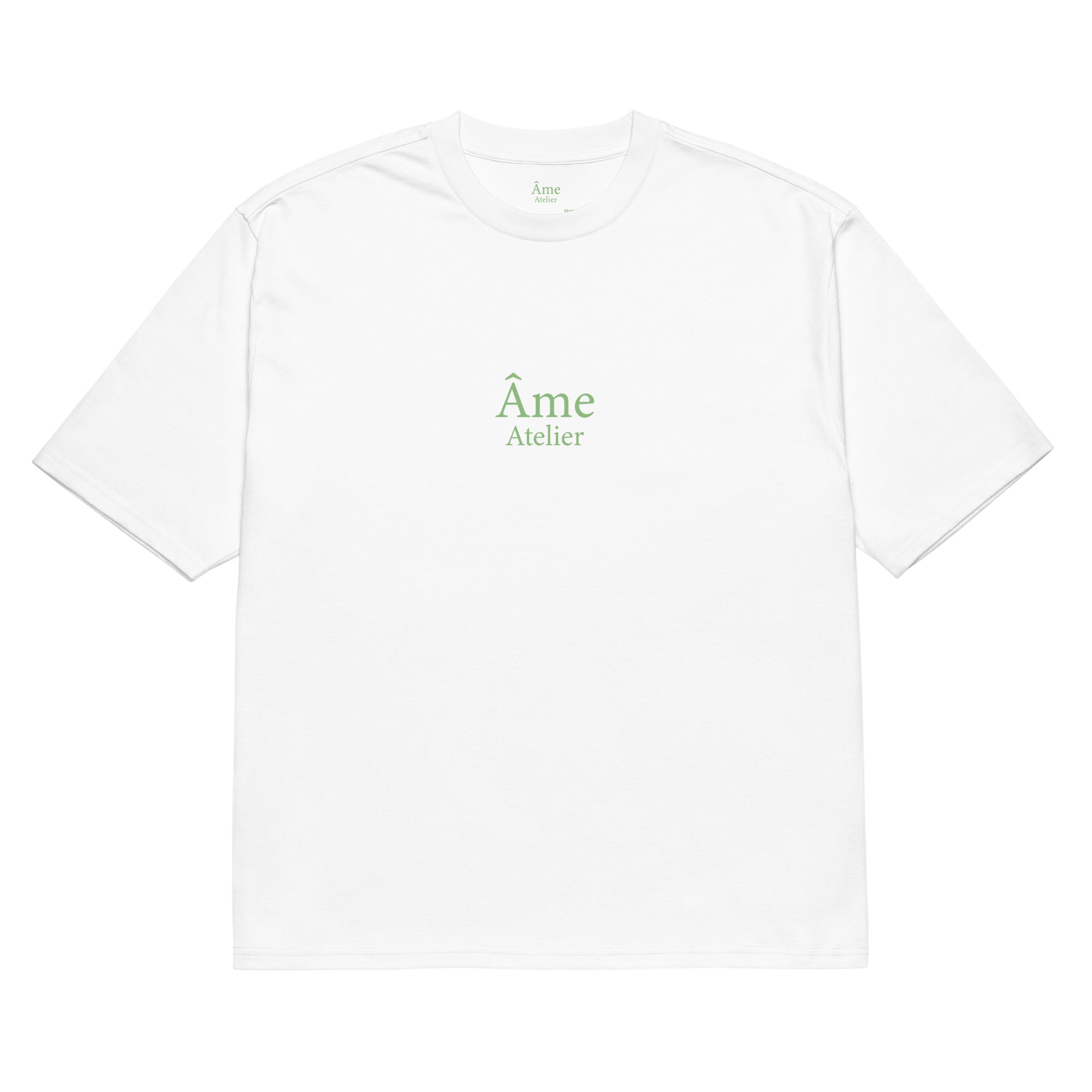 Front view of Âme Atelier Club oversized t-shirt in white with pistachio details