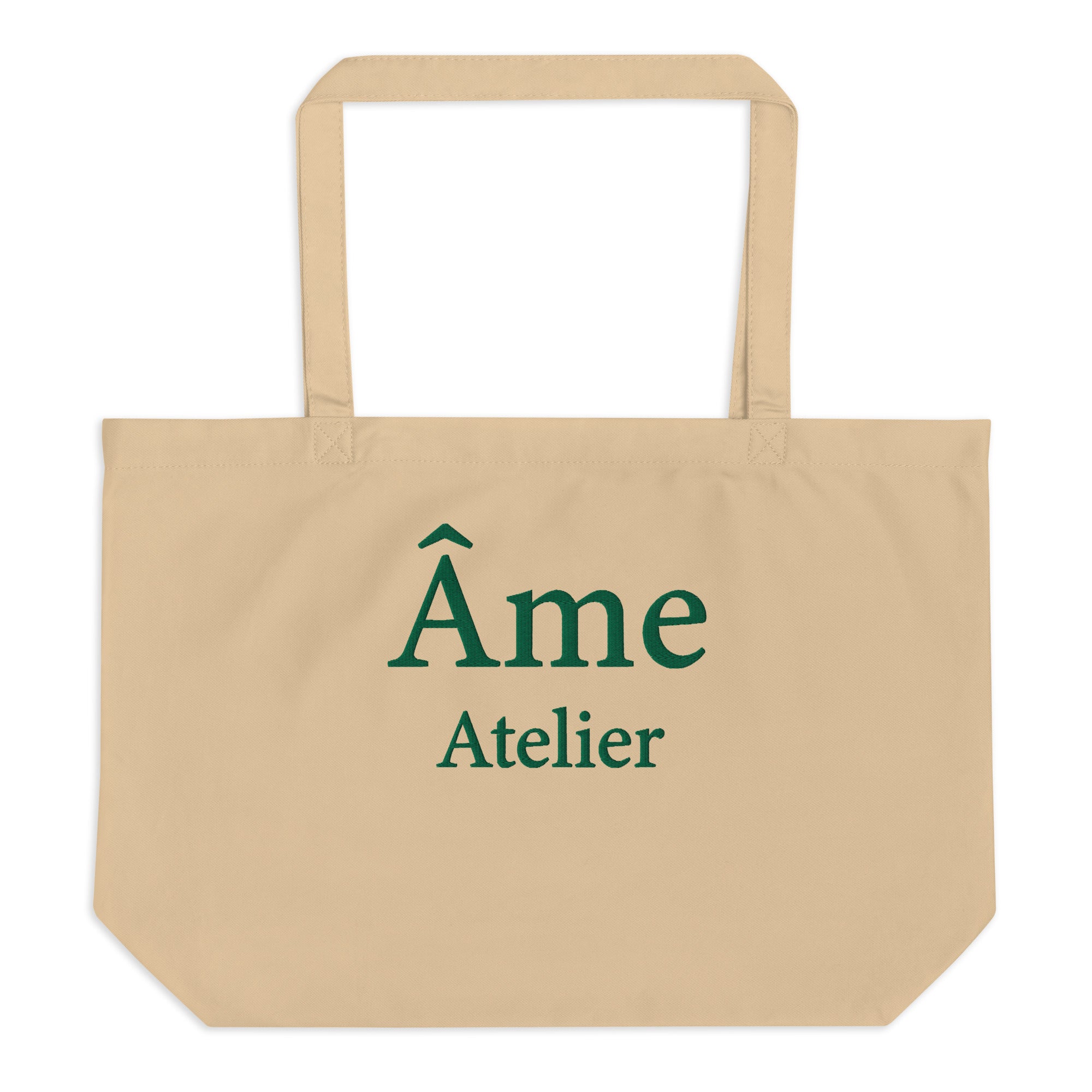 Front view of Âme Atelier embroidered large tote bag in beige