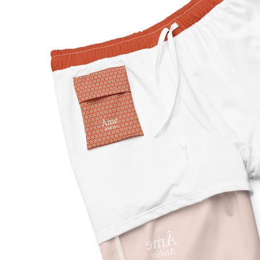 Inside pocket of Âme Atelier swimming shorts in terracotta
