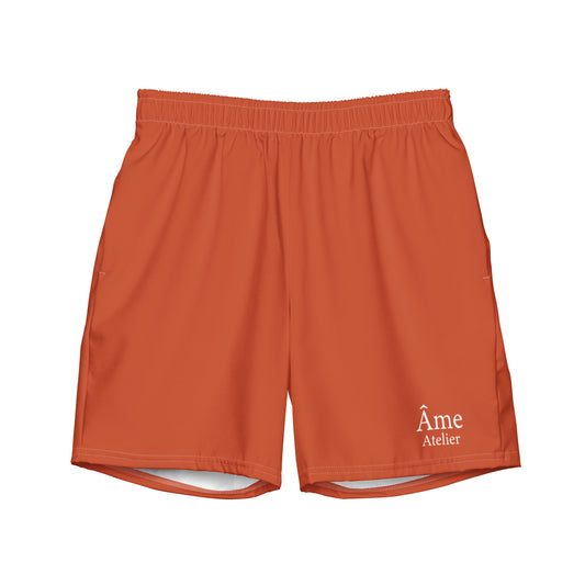 Front view of Âme Atelier swimming shorts in terracotta