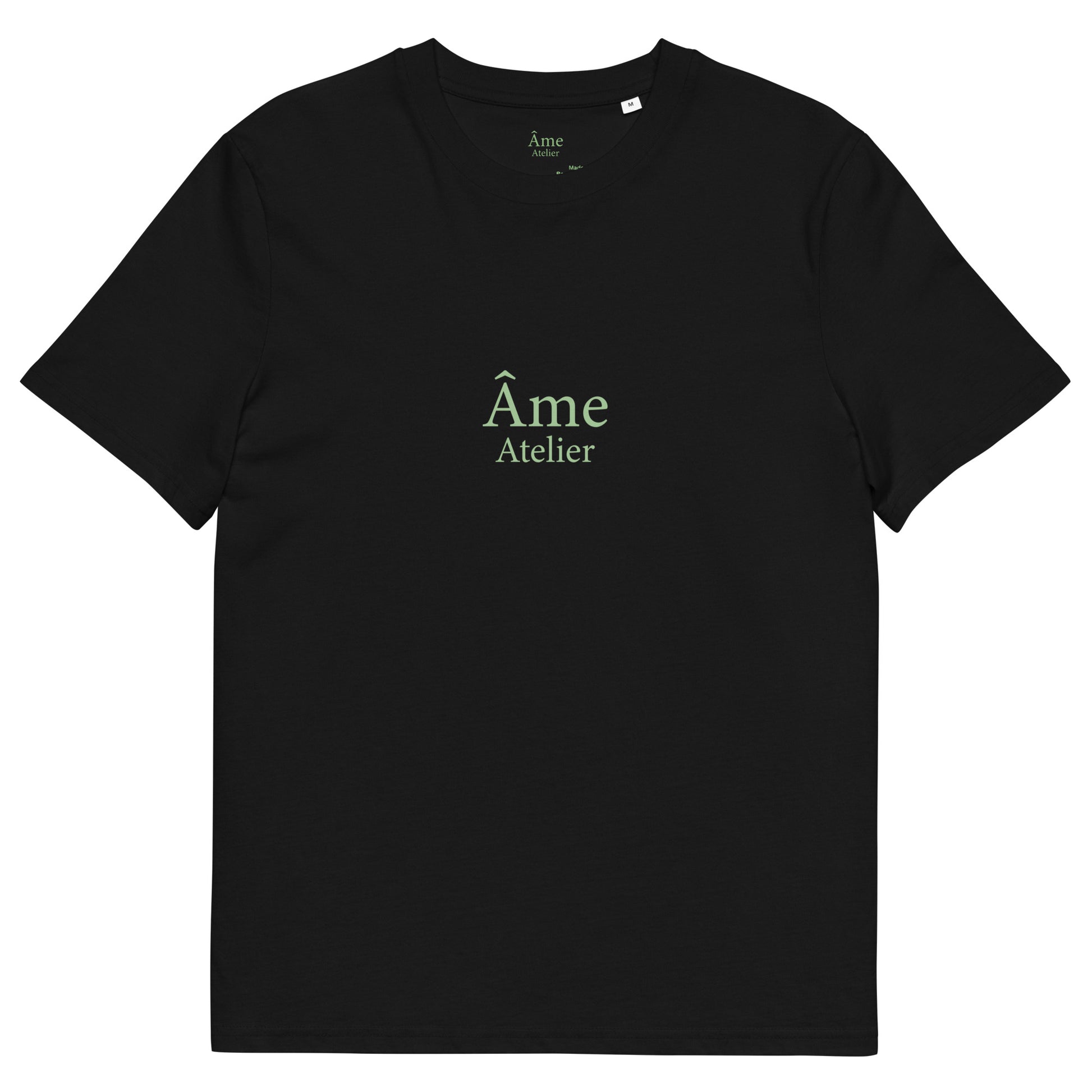 Front view of Euphorie organic cotton t-shirt in black with pistachio details