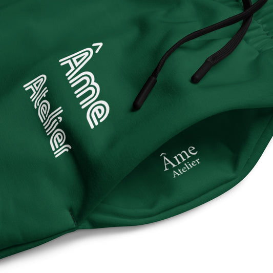 Close up of Le Cosy pants in abyss green