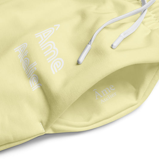 Close up of Le Cosy pants in soft yellow
