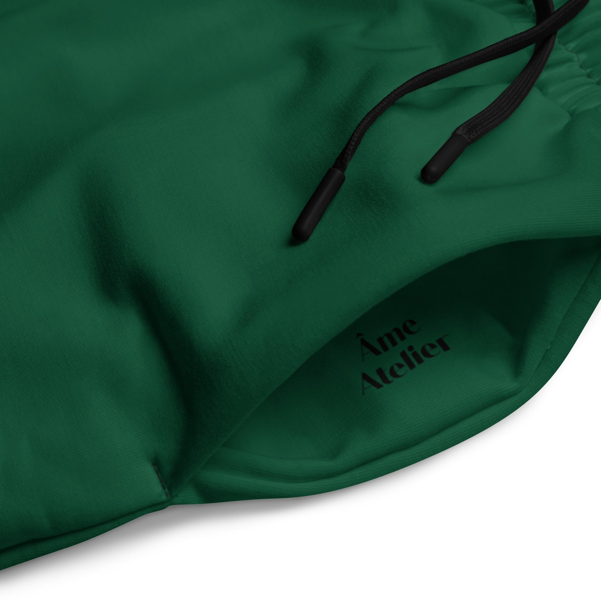 Details of Le Cosy recycled polyester trousers in abyss green