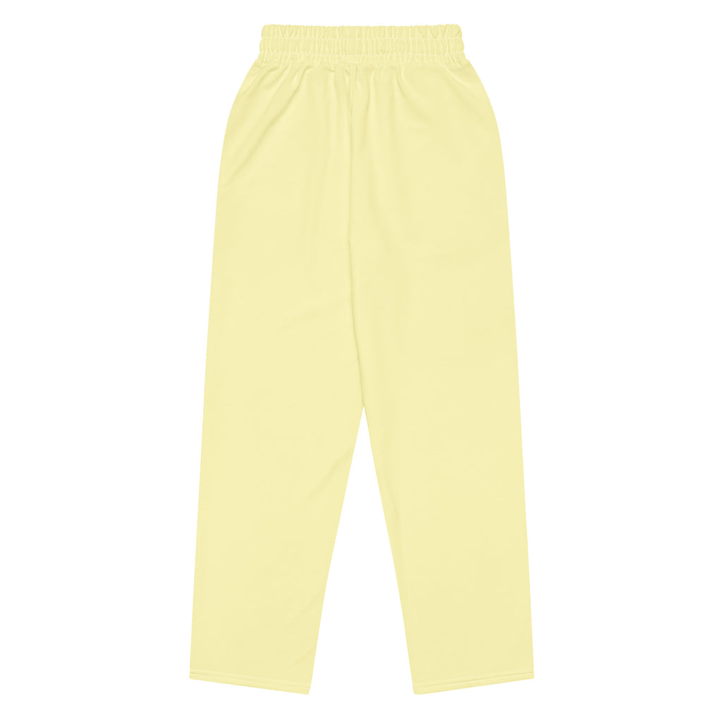 View of Le Cosy recycled polyester trousers in soft yellow