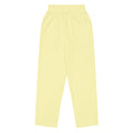 View of Le Cosy recycled polyester trousers in soft yellow