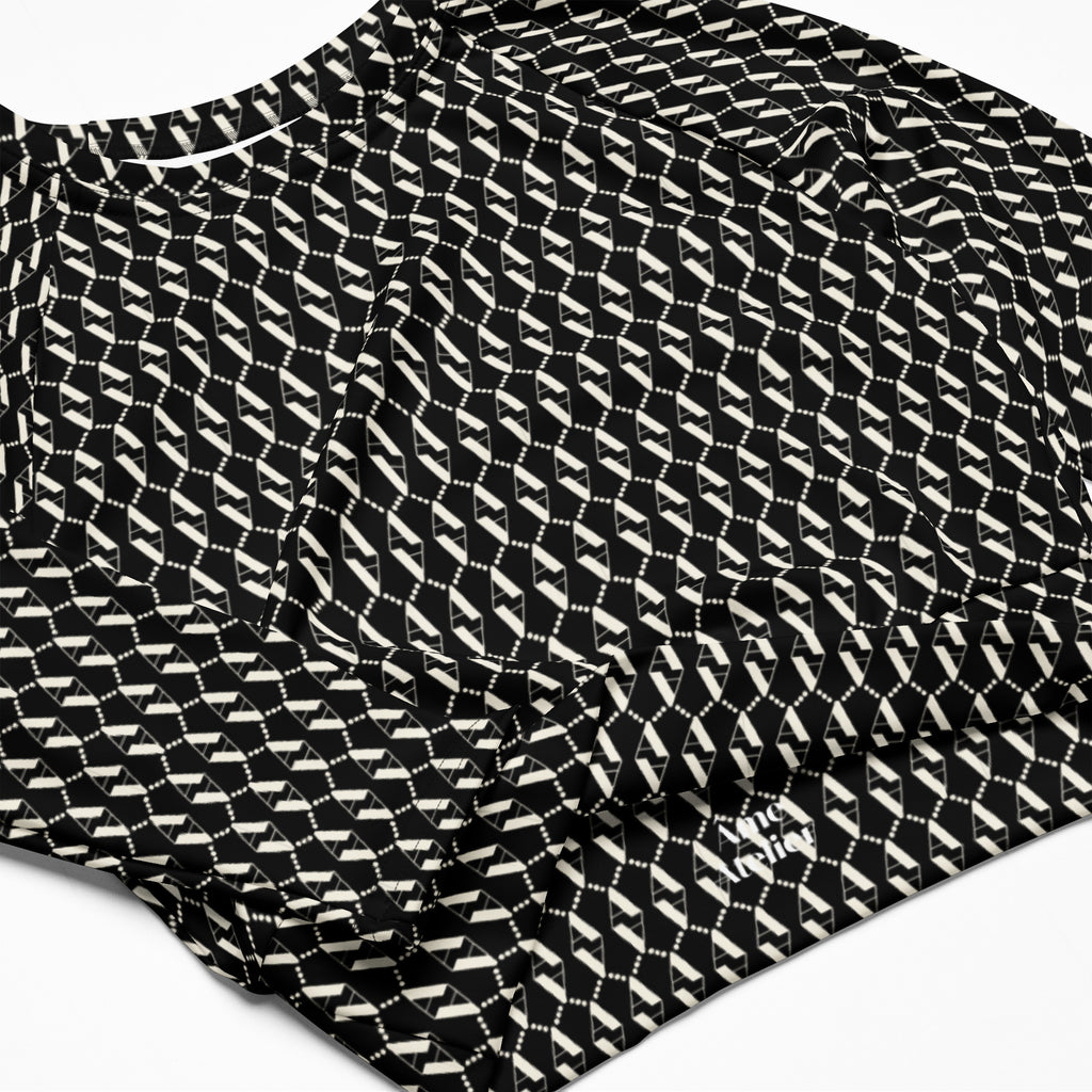 Details of Le Monogramme recycled polyester crop top in black with iconic Â monogramme printed