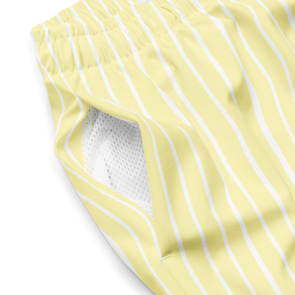 Close up of Le Rayé striped swimming shorts in soft yellow