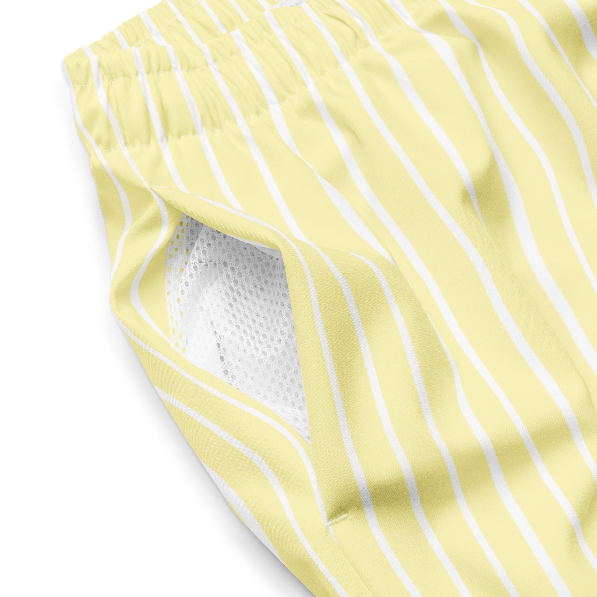 Close up of Le Rayé striped swimming shorts in soft yellow