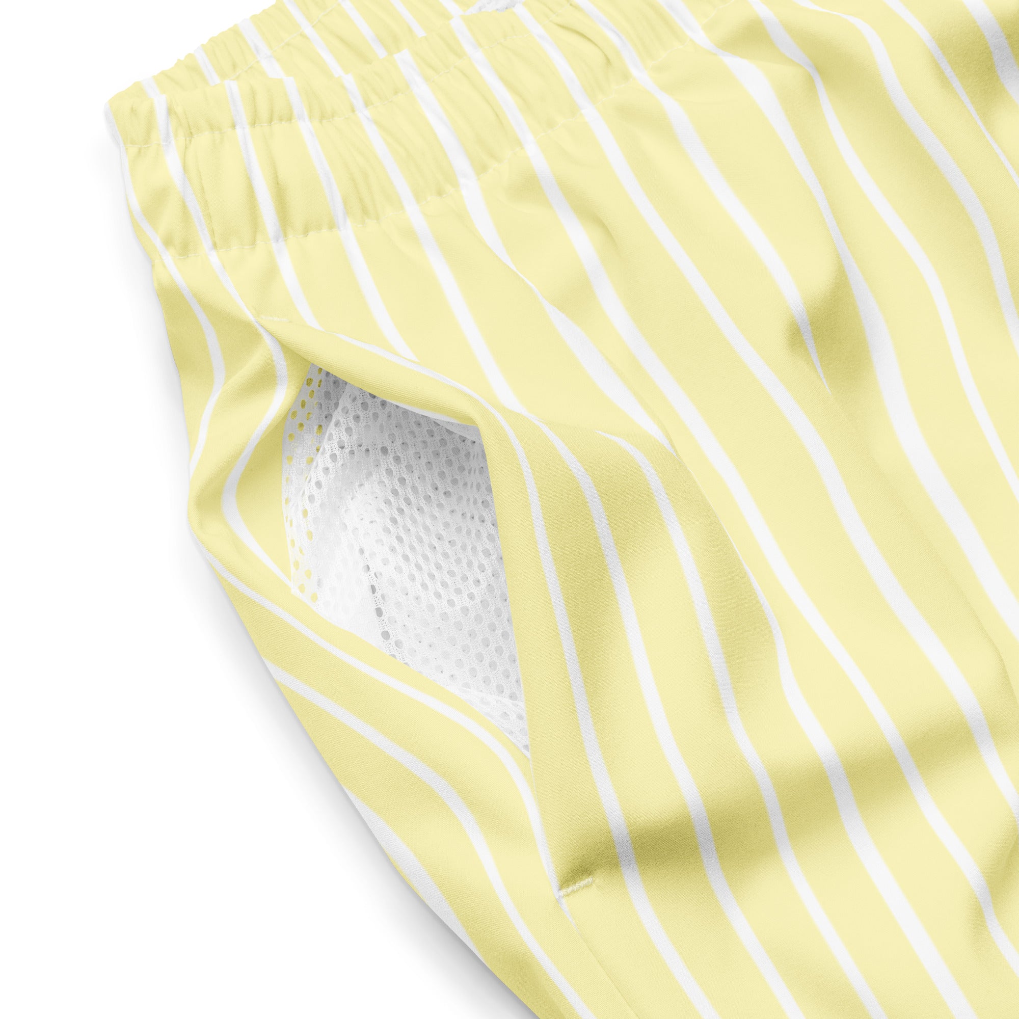 Close up of Le Rayé striped swimming shorts in soft yellow