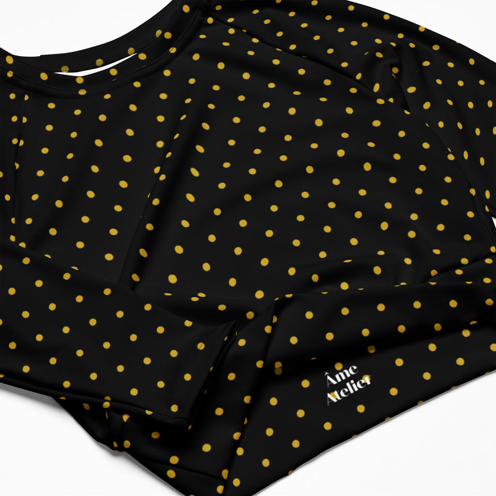 Details of Les Pois recycled polyester crop top in black with yellow polka dots printed