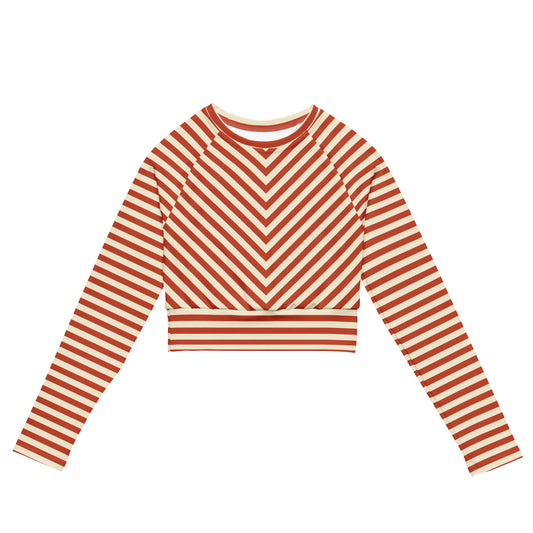 Front view of L'hypnotique striped crop top in terracotta