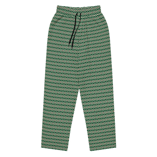 Front view of L'œil de paon pants in abyss green with peacock pattern