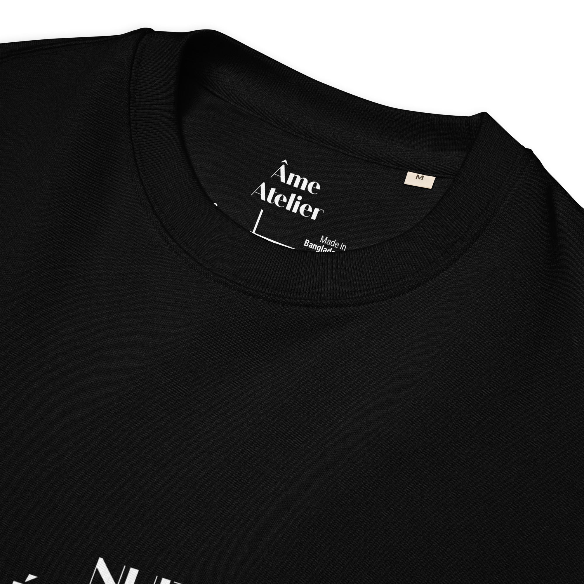 Details of Nuit Éphémère black sweatshirt in organic cotton with a printed moon