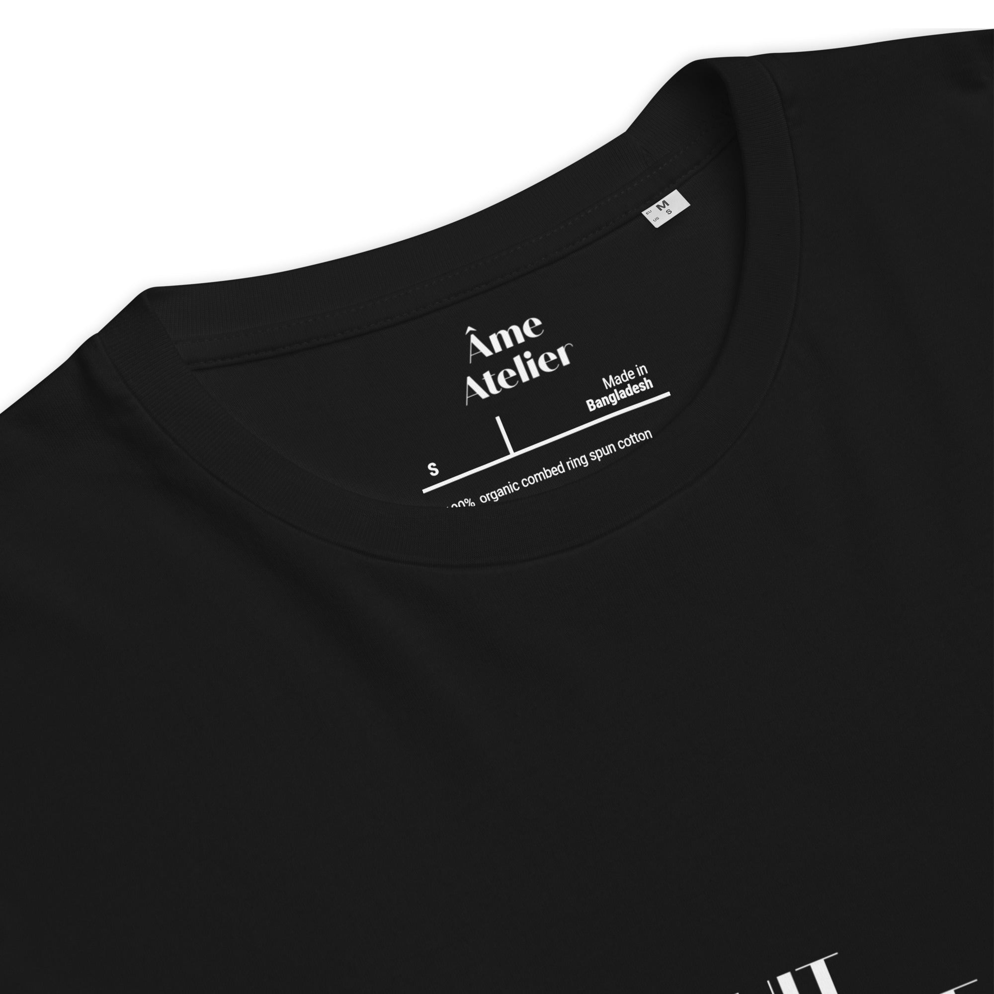 Details of Nuit Éphémère black t-shirt in organic cotton with a printed moon