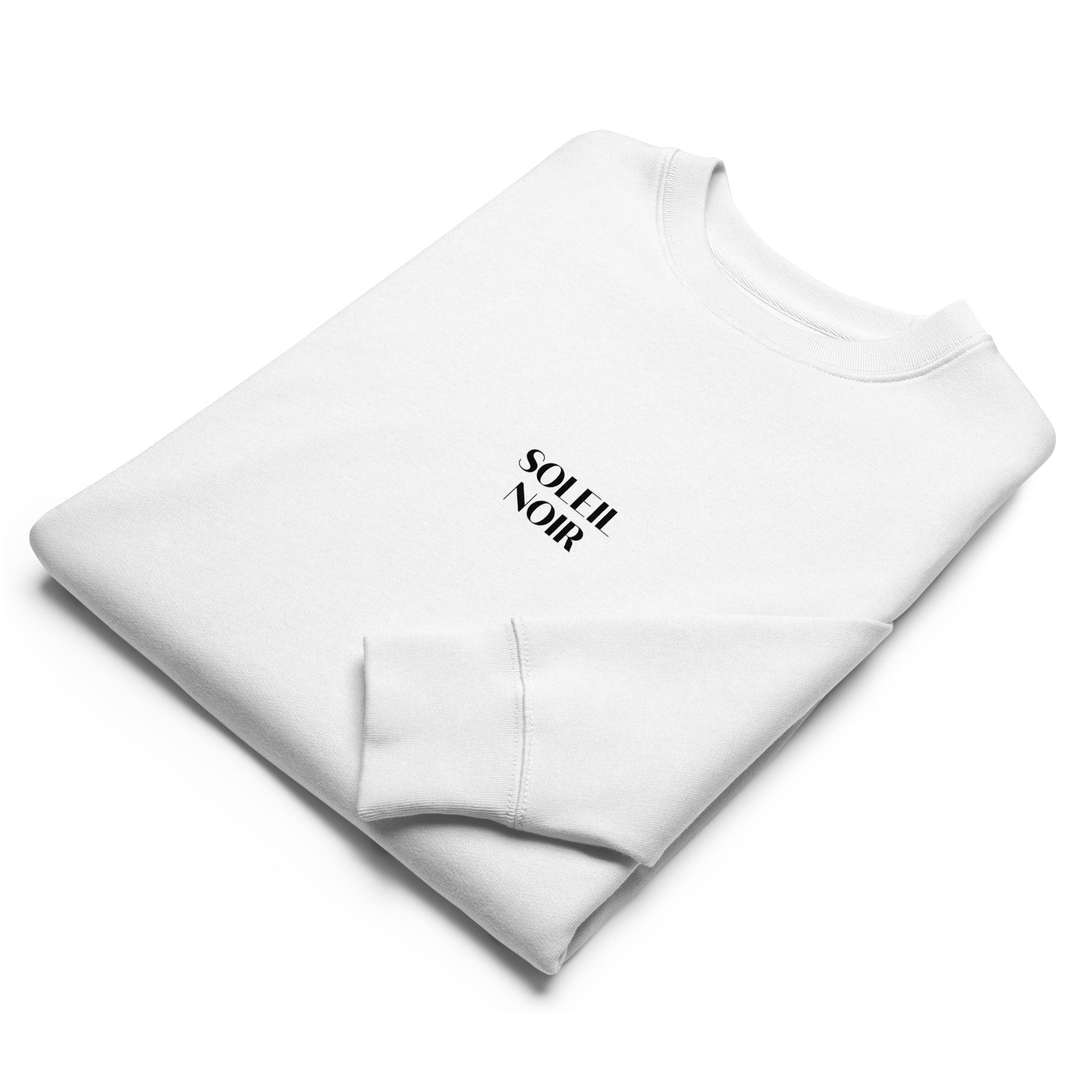Folded view of Soleil Noir white sweatshirt in organic cotton with a printed black sun