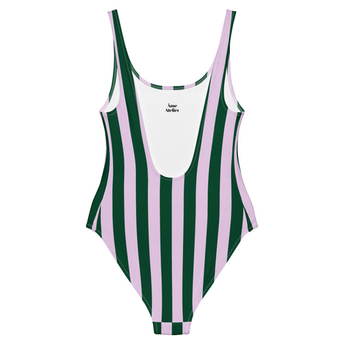 Back view of Le Vibrant swimsuit in green and pink with an open back